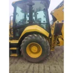 2021 Caterpillar 420 XE 4WD Loader Backhoe